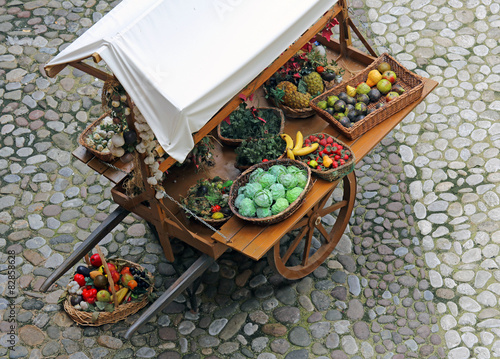 cart with fruits and vegetables for sale  photo