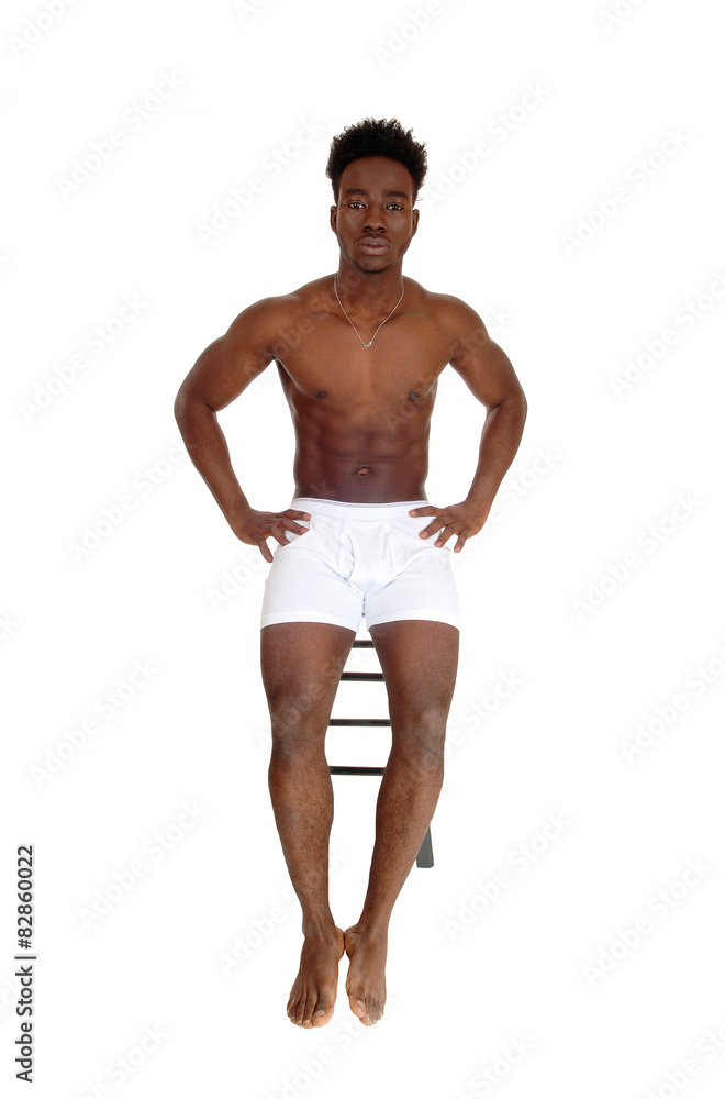 Black man in white underwear.