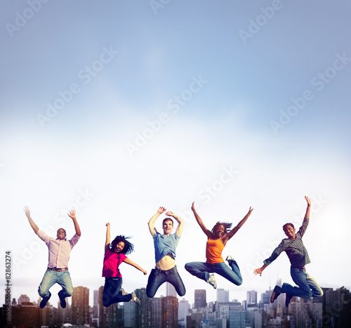 Teenage Success Team Jumping Cheerful Concept