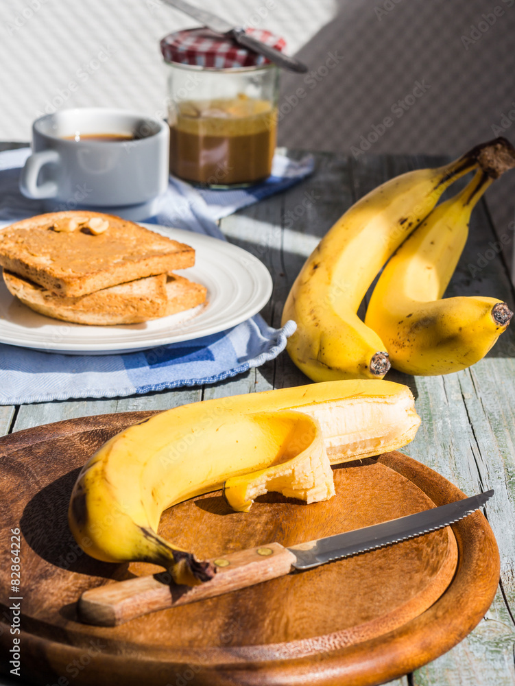 fresh, ripe banana on a wooden board fresh, ripe banana on a wooden board
