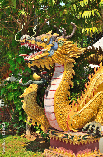 Dragon statue at temple wall