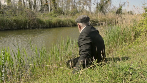 Old man fishing photo