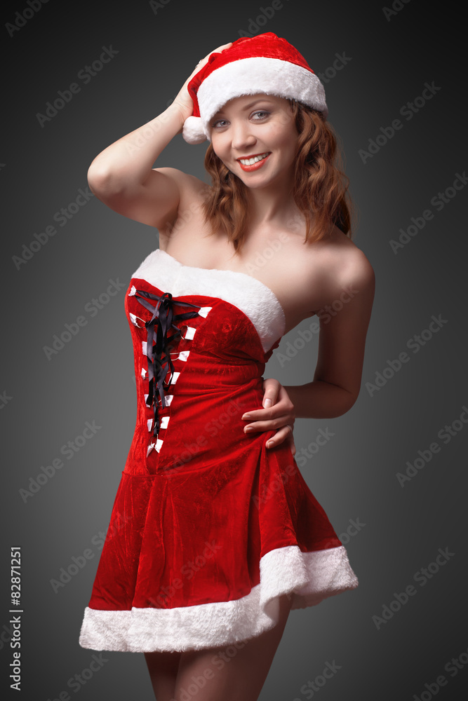 sexy beautiful girl dressed as Santa's helper is posing. sexy beautiful girl dressed as Santa's helper is posing.