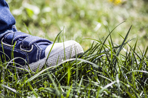 sneakers tramples grass