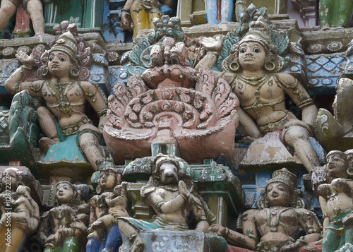 Statues around two Dwarapalakas.