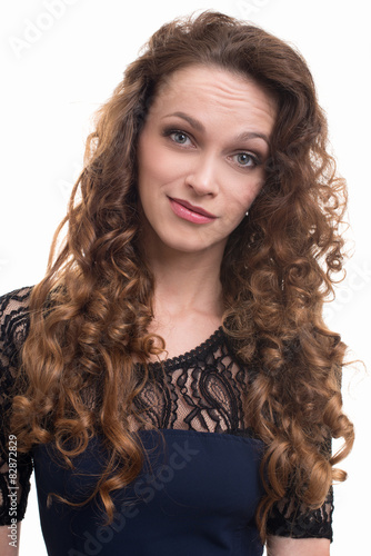 beautiful young woman with long curly hair