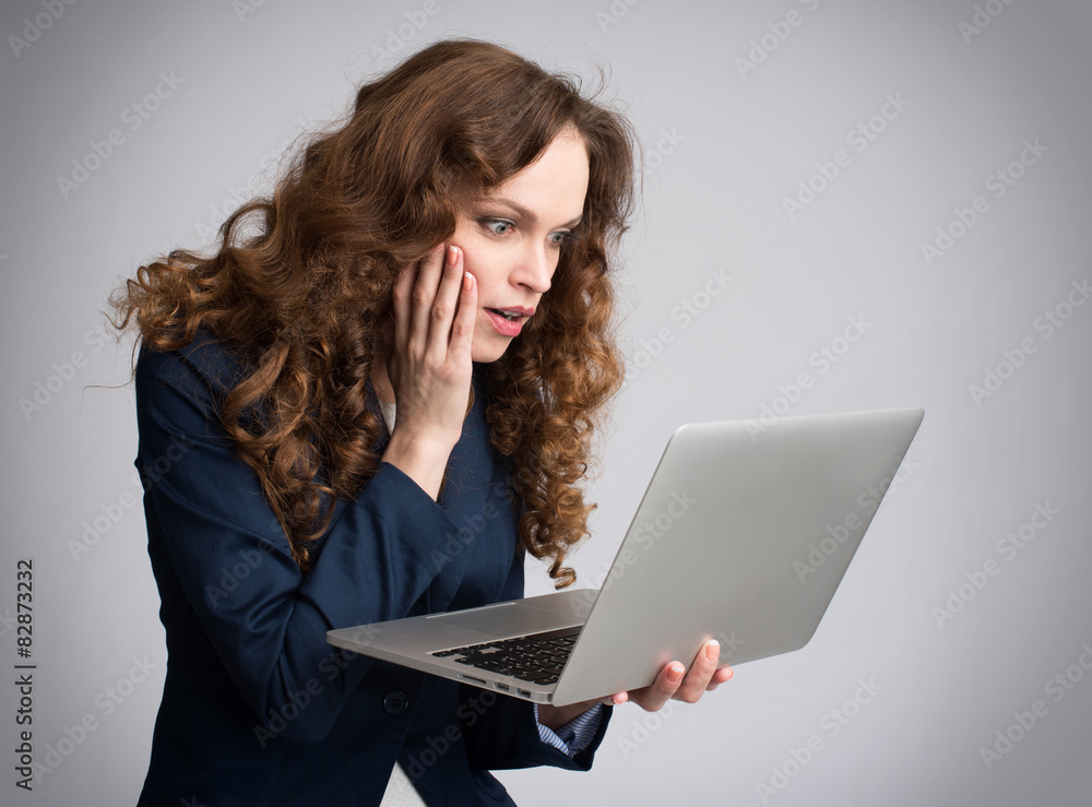 Young woman having trouble with laptop Young woman having trouble with laptop