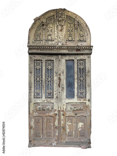 Old brown vintage wooden door with decoration isolated