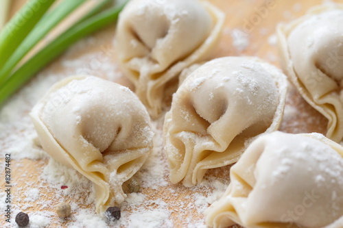 Homemade uncooked dumplings with meat