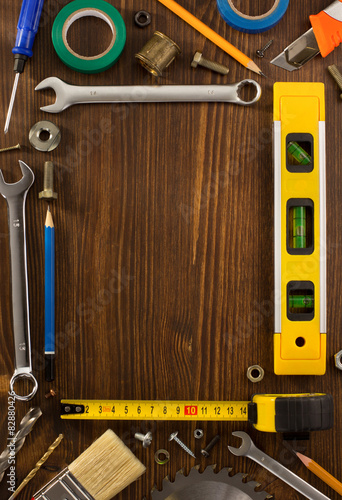 set of tools and instruments on wood photo