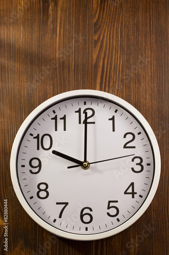 wall clock on wood