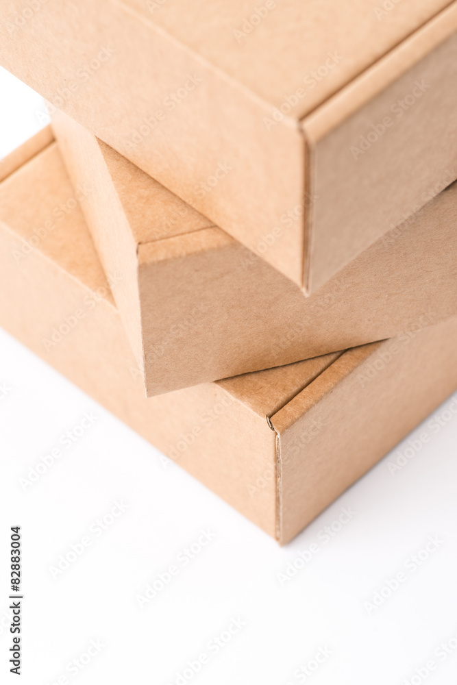 Brown cardboard boxes on a white background Brown cardboard boxes on a white background