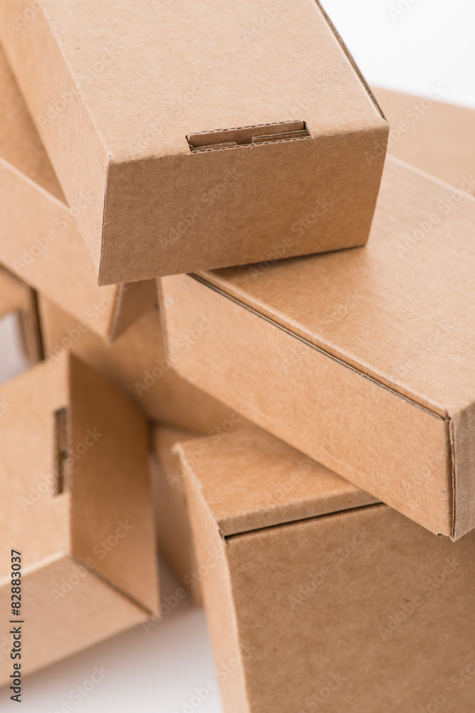 Brown cardboard boxes on a white background Brown cardboard boxes on a white background