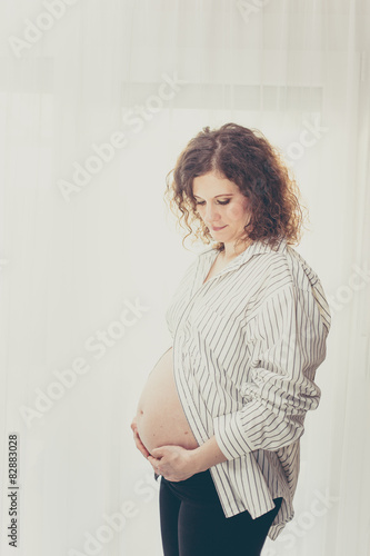 beautiful pregnant young woman