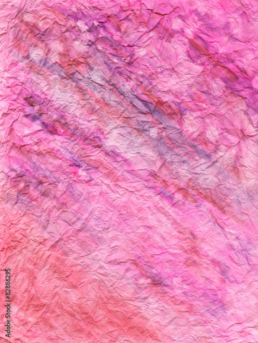 high resolution crumpled and wrinkled pink and purple paper back