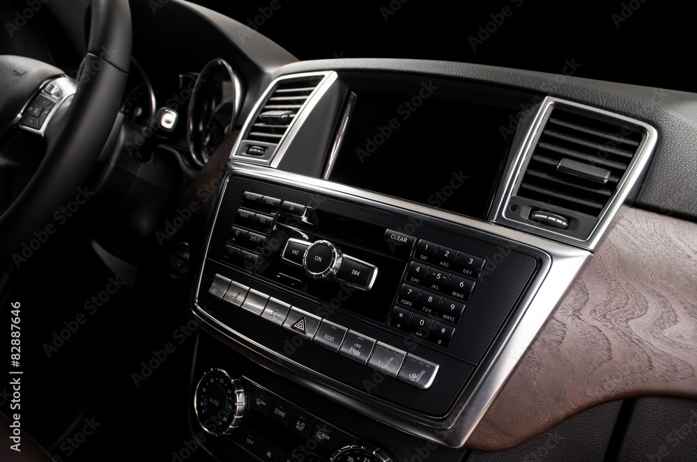 Screen multimedia system. Modern car dashboard. Interior detail.