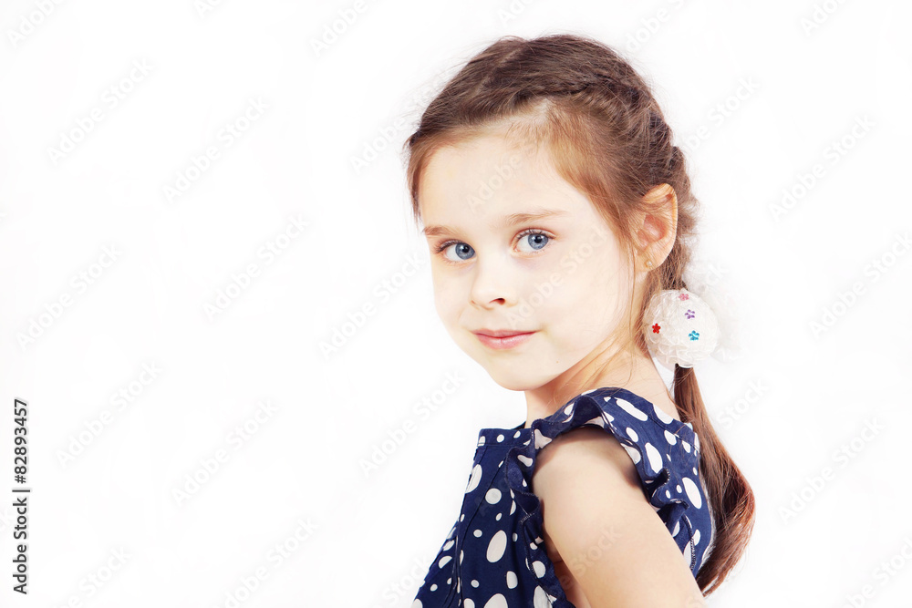 Portrait of pretty cute girl wearing the dark blue dress Portrait of pretty cute girl wearing the dark blue dress