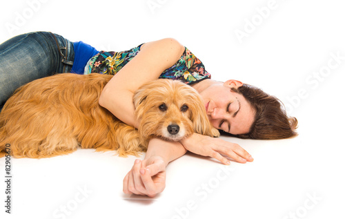 Woman sleeping with her dog © luismolinero