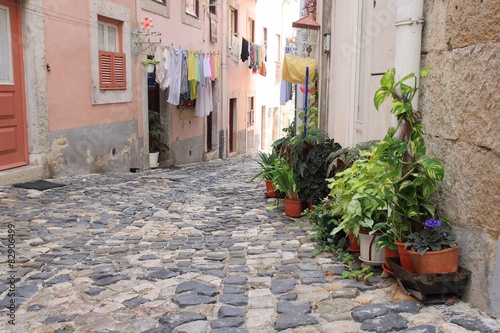 Fototapeta Naklejka Na Ścianę i Meble -  Small street in Alfama, Lisbon
