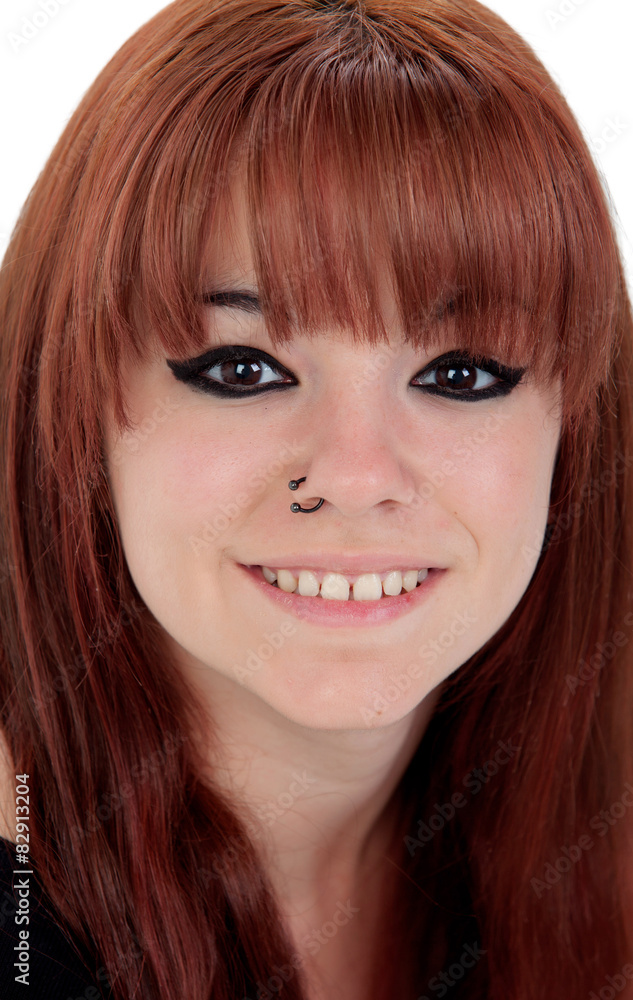 Portrait of teenage girl dressed in black with a piercing Portrait of teenage girl dressed in black with a piercing
