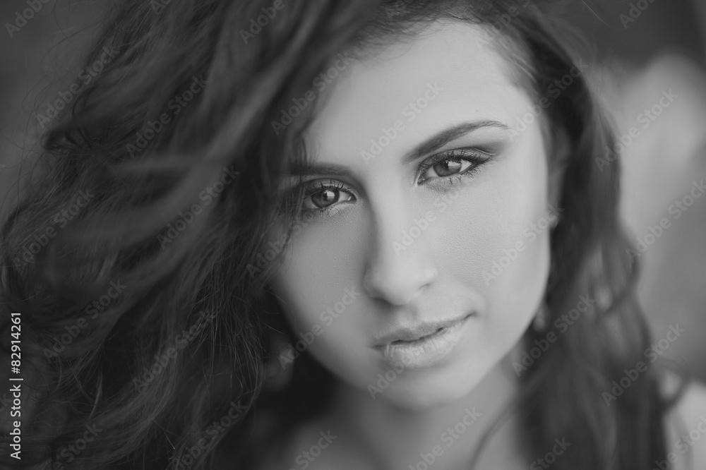 Portrait of a beautiful brunette girl on the nature Portrait of a beautiful brunette girl on the nature