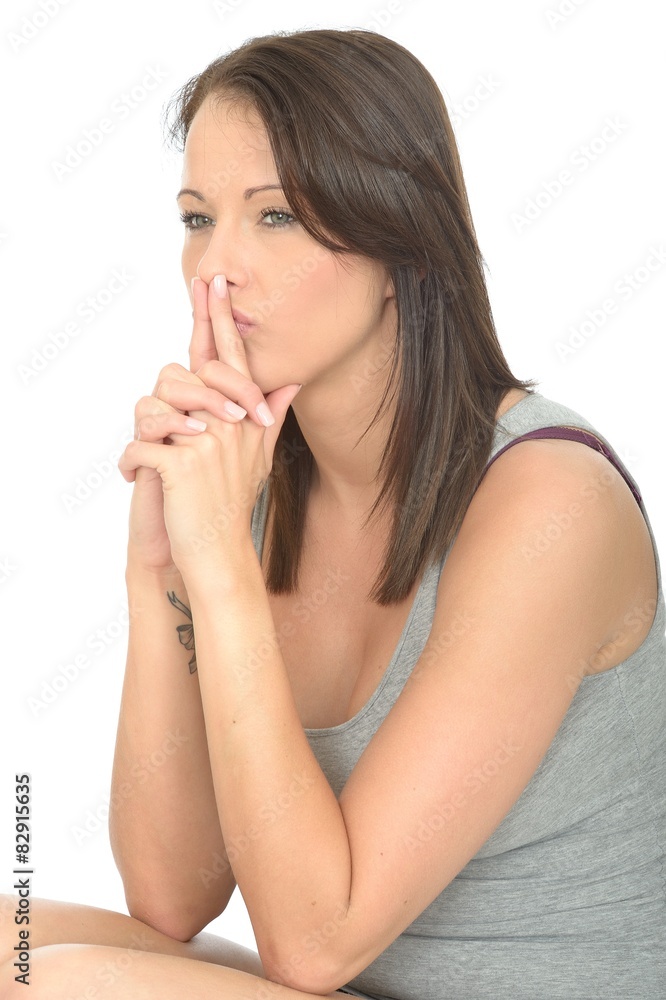 Portrait of a Thoughtful Concerned Attractive Young Woman Portrait of a Thoughtful Concerned Attractive Young Woman
