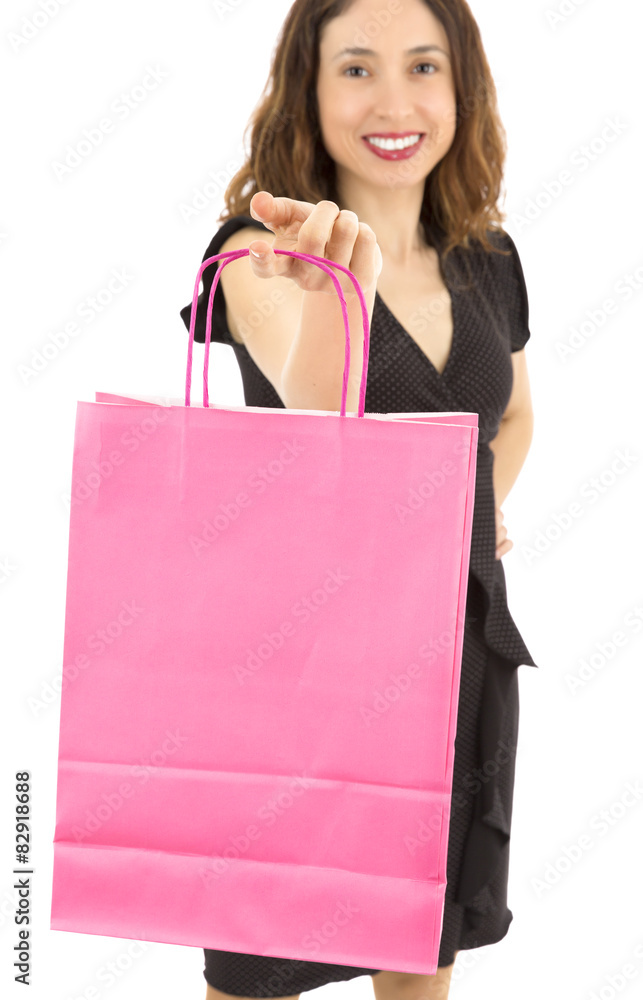 Shopping woman showing a pink blank shopping bag Shopping woman showing a pink blank shopping bag