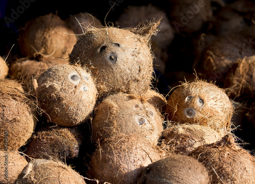 Pile peel coconut look like face of monkey.