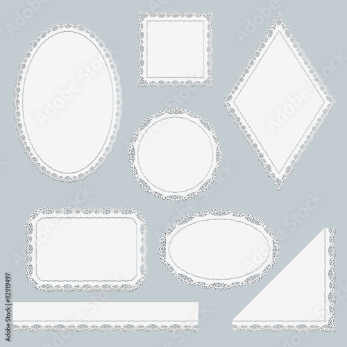 Set of white lace elements isolated on gray background.