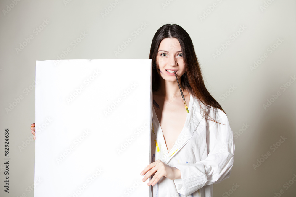 beautiful artist holding a blank canvas for your records beautiful artist holding a blank canvas for your records