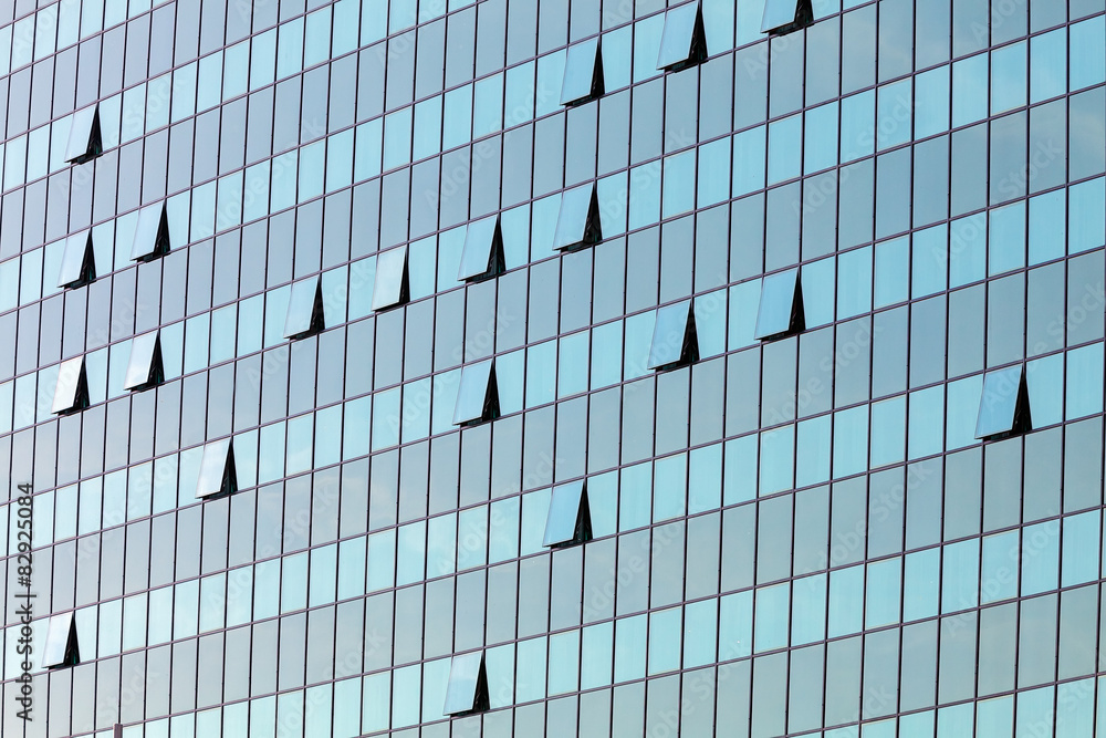 glass facade with opened windows glass facade with opened windows