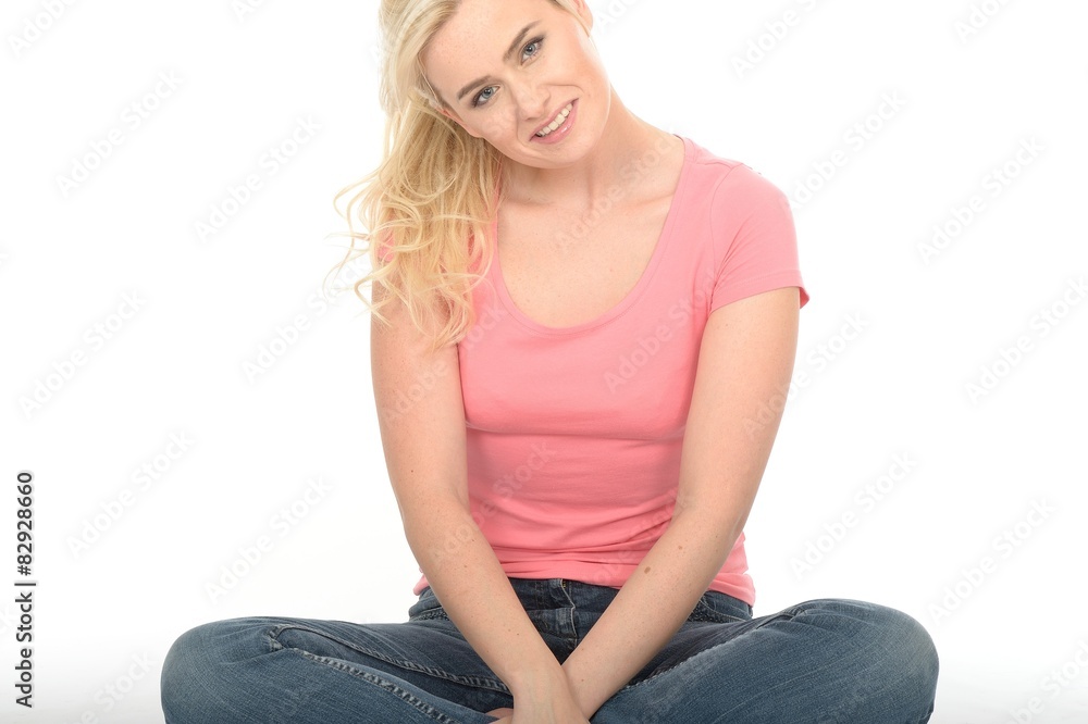 Happy Relaxed Young Woman Sitting on the Floor