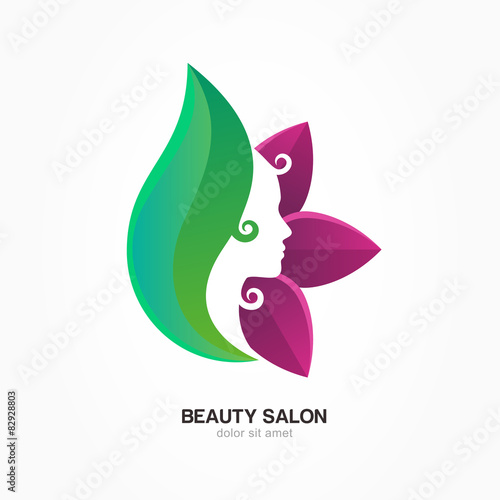 Beautiful woman's profile face in purple and green flower leaves