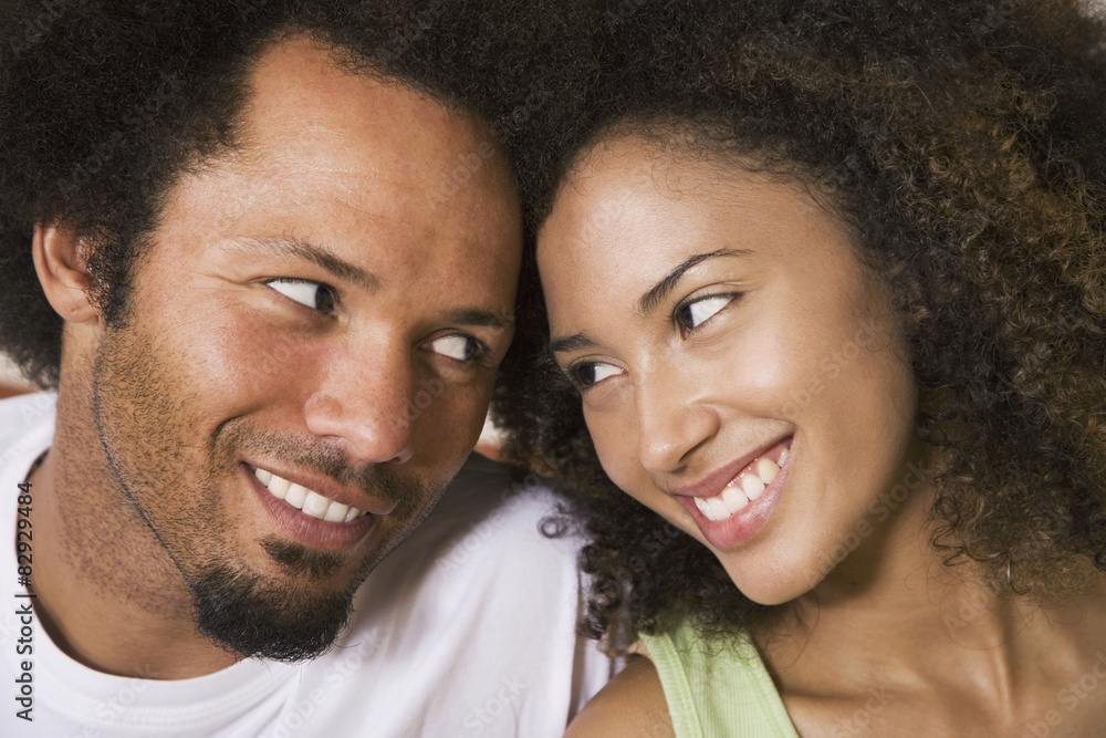 African couple smiling at each other African couple smiling at each other
