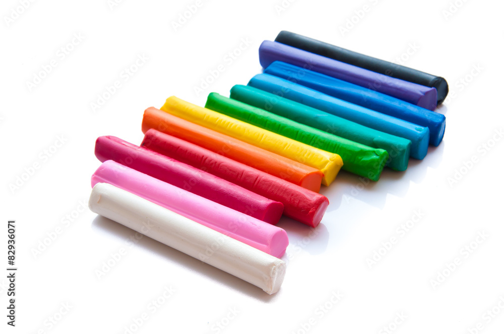 Rainbow colors plasticine play dough modeling clay isolated over Rainbow colors plasticine play dough modeling clay isolated over