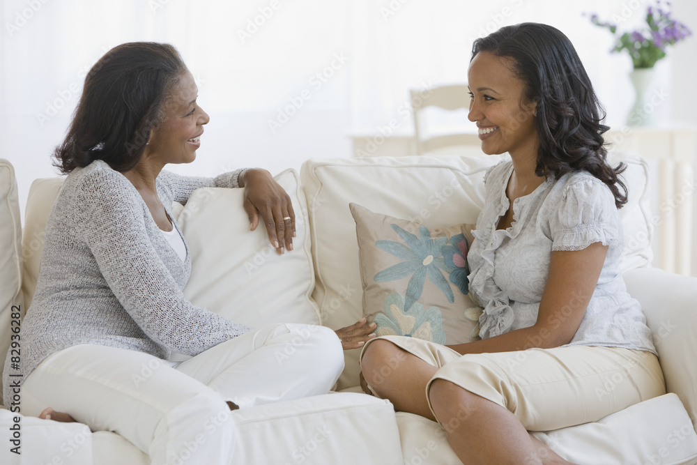 African American mother and adult daughter talking African American mother and adult daughter talking