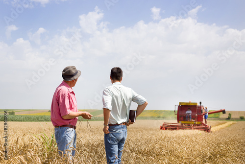 Business partners on wheat field