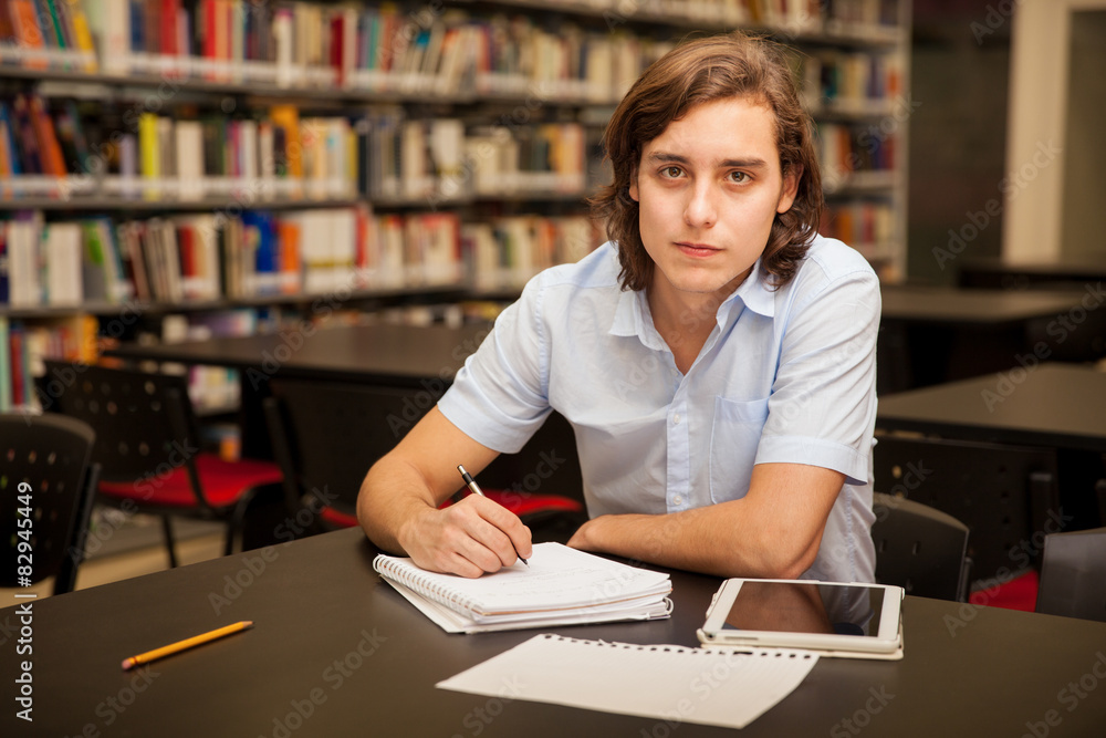 Handsome college student working Handsome college student working