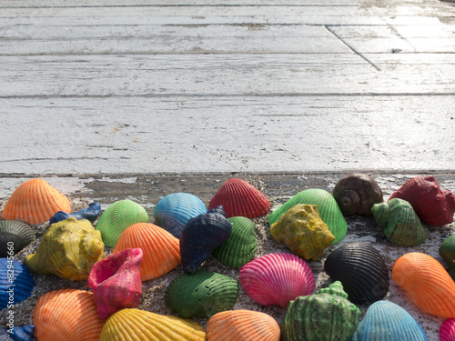 old wooden table with amazing seashells photo