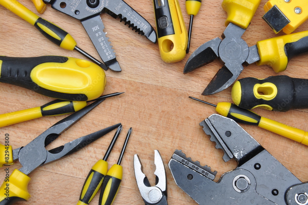Tools for electrical installation on wooden board Tools for electrical installation on wooden board