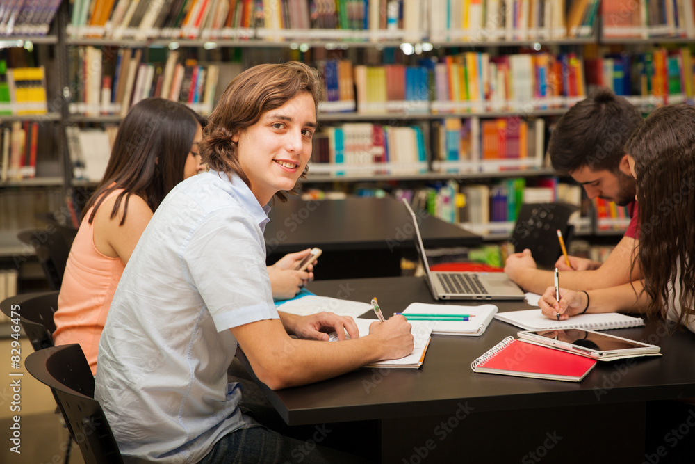 Doing homework in the library Doing homework in the library