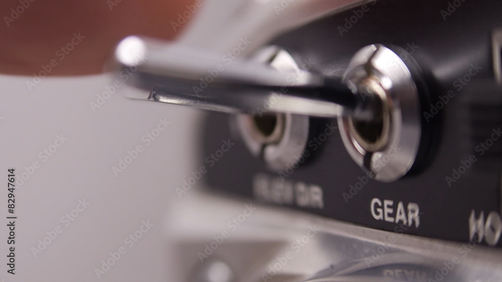 Toggle switch to position on and off. Closeup Toggle switch to position on and off. Closeup