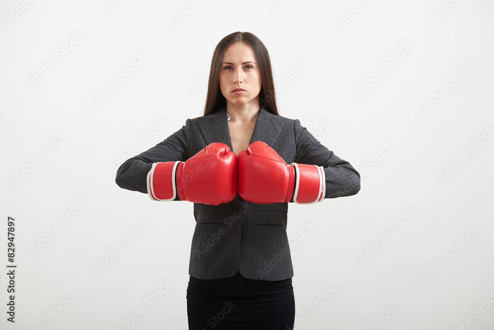 businesswoman in red boxing gloves businesswoman in red boxing gloves