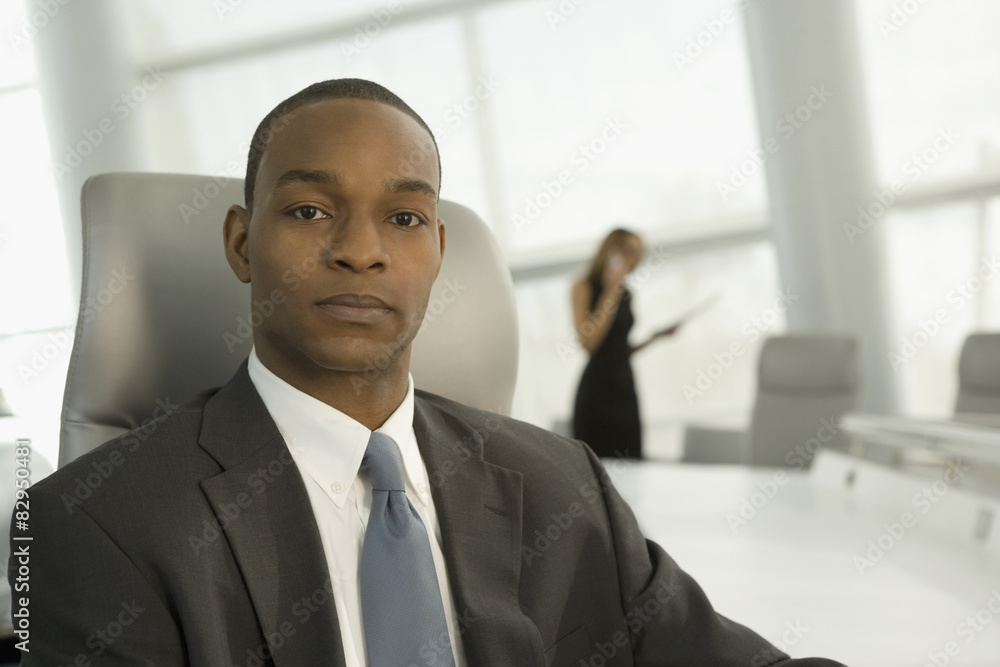 Close up of African businessman in conference room Close up of African businessman in conference room