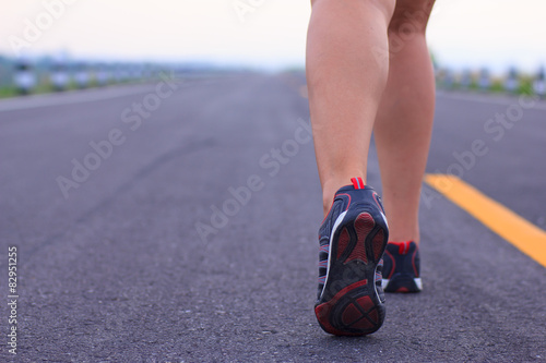 Stock Photo - athlete running sport feet on trail healthy lifest