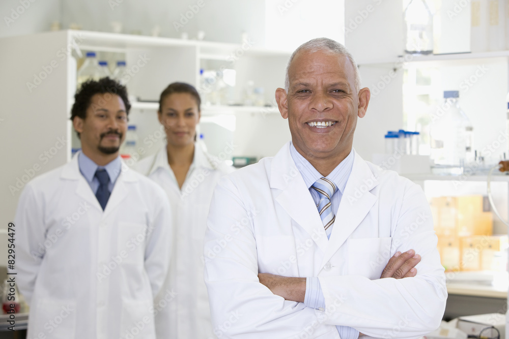 Smiling African scientists in laboratory Smiling African scientists in laboratory