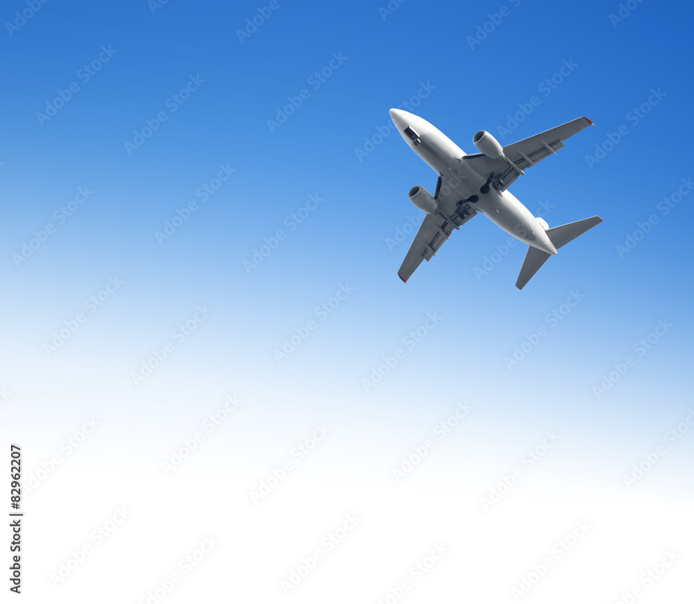 Airplane flying in the blue sky Airplane flying in the blue sky