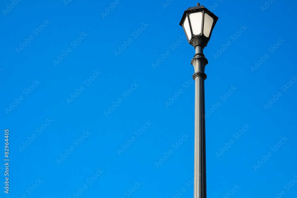 Retro street lamp on the blue background