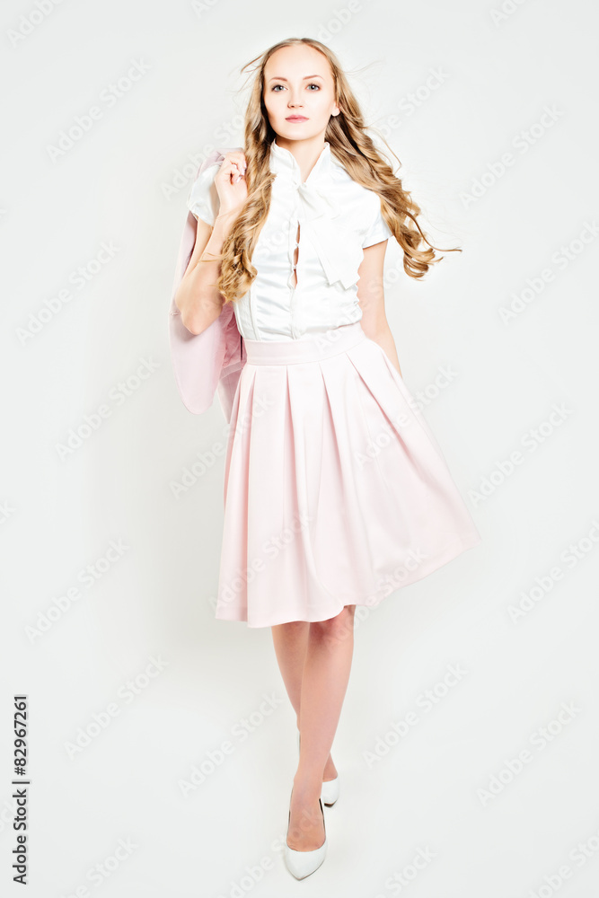 Elegance Woman Wearing Light Pink Suit. Fashion Photo