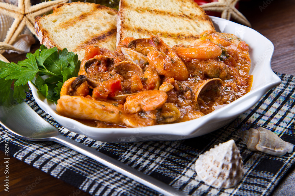 seafood soup with tomatoes and squid seafood soup with tomatoes and squid